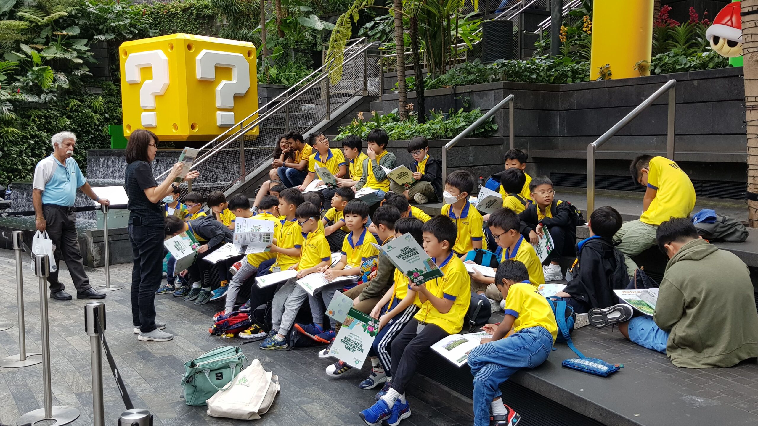 Skool4Kidz Punggol children walking through Jewel greenery