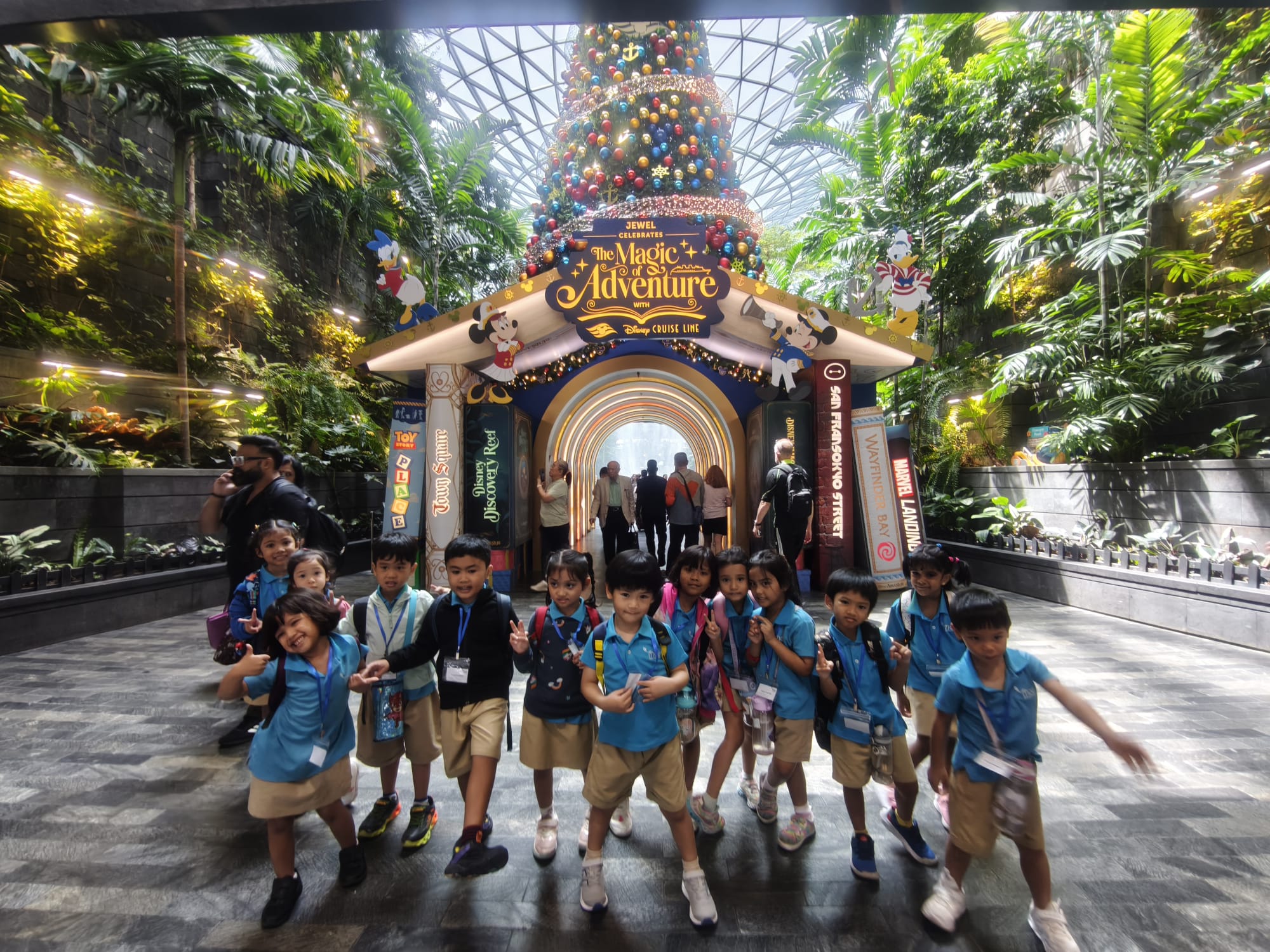 Children holding Global Trotter craft boards